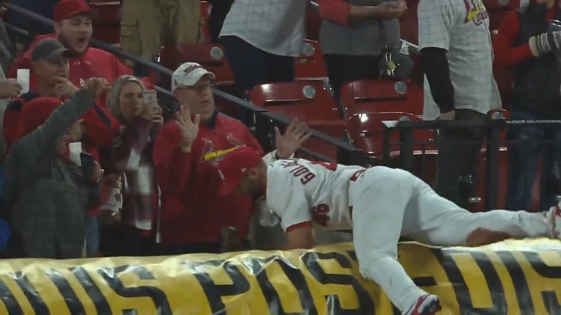 Cardinals' Paul Goldschmidt secures a victory against the Pirates with a spectacular grab in foul ground