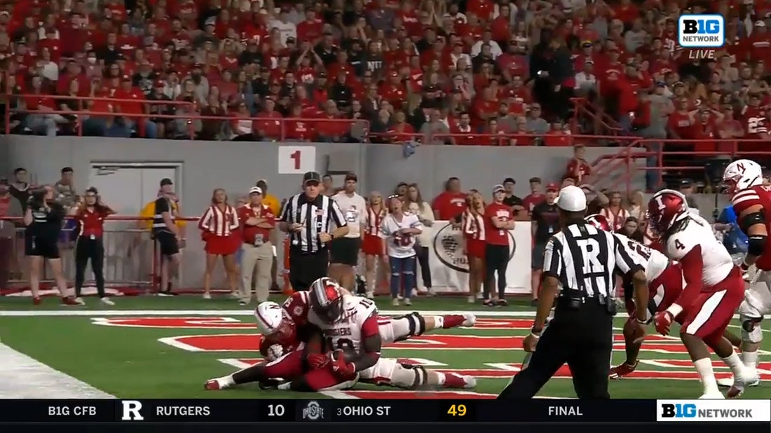 Indiana's Louis Moore comes up with the strip sack to force the Hoosier's touchdown