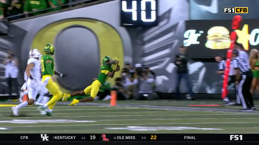 Oregon's Bo Nix threads the needle to Troy Franklin for the tip-toe touchdown