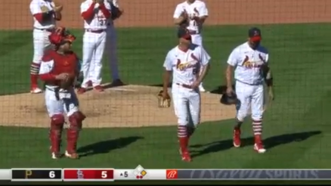 Cardinals' Yadier Molina, Adam Wainwright and Albert Pujols receive a standing ovation during exit