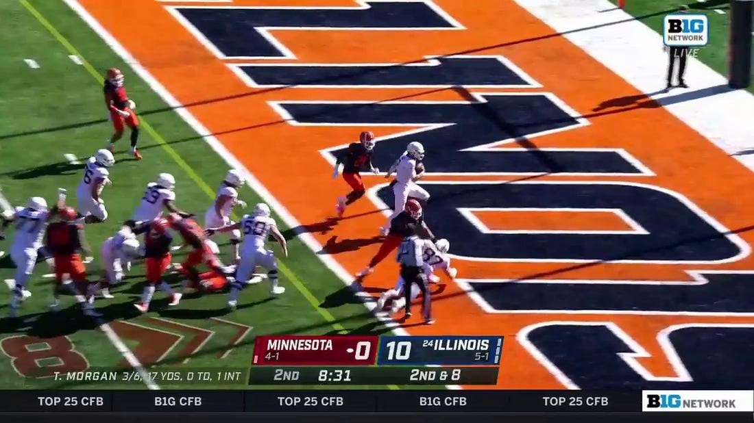 Minnesota's Tanner Morgan finds a hole for a nine-yard rushing TD