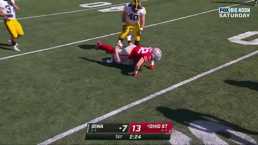 Iowa punter Tory Taylor decides to run for it on 4th down... and makes the wrong call