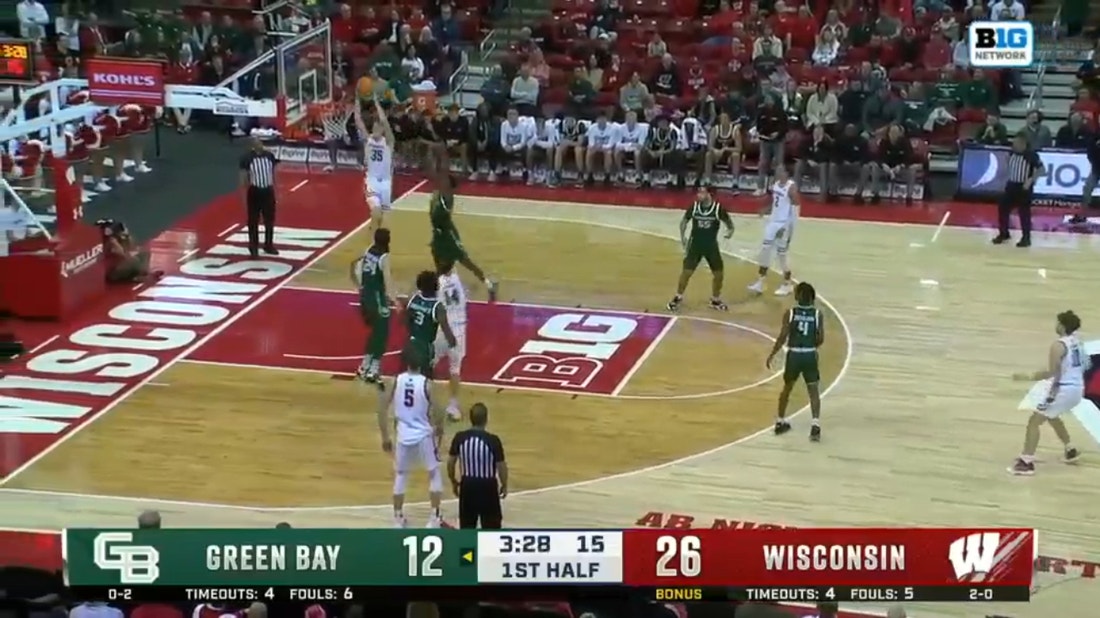 Max Klesmit finds Markus Ilver on an alley-oop for the Badgers