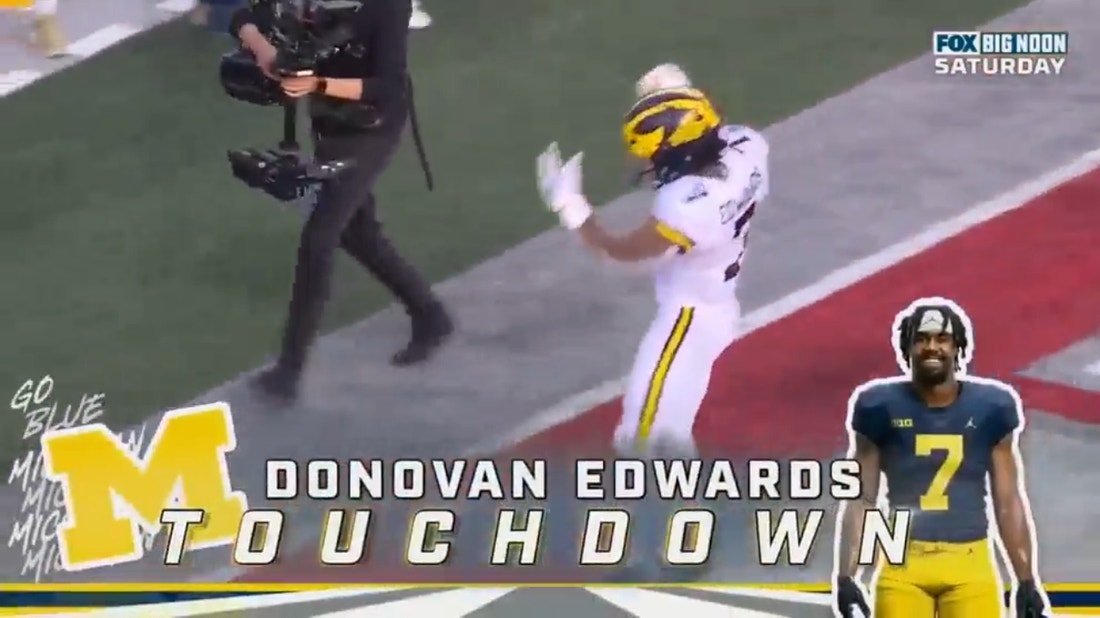 Donovan Edwards rushes in a 75-yard touchdown to extend the Michigan Wolverines' lead