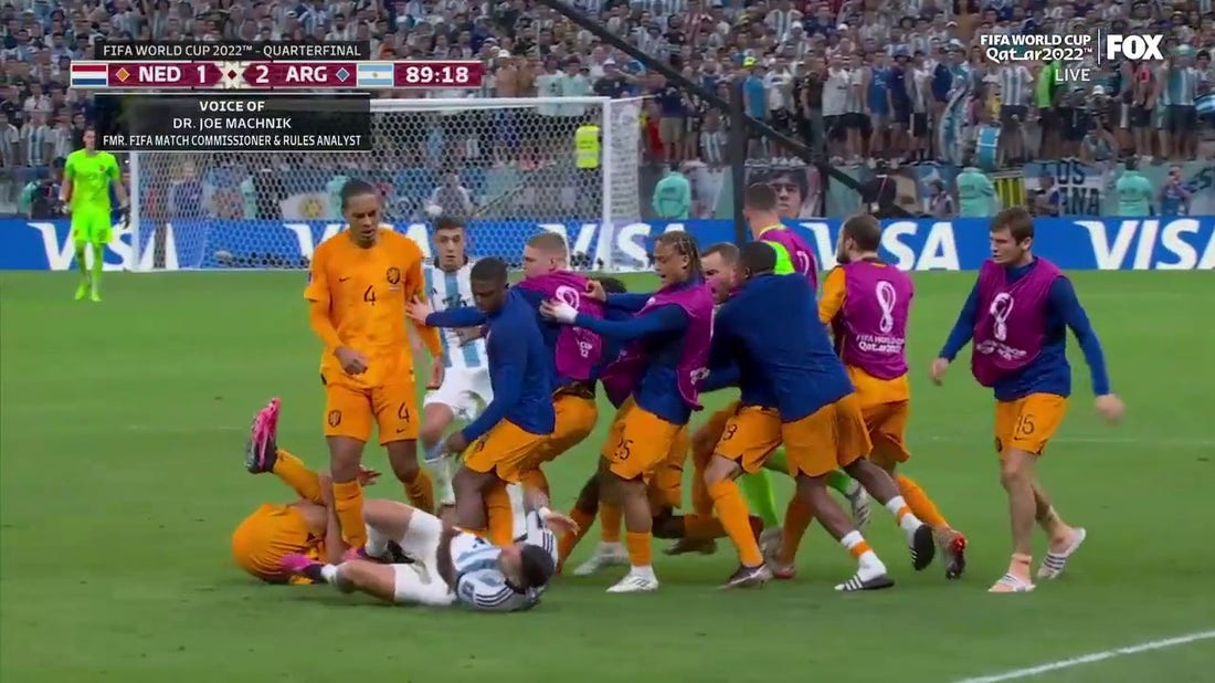 A scuffle ensues between the Netherlands and Argentina which leads to a yellow card for Leandro Paredes | 2022 FIFA World Cup