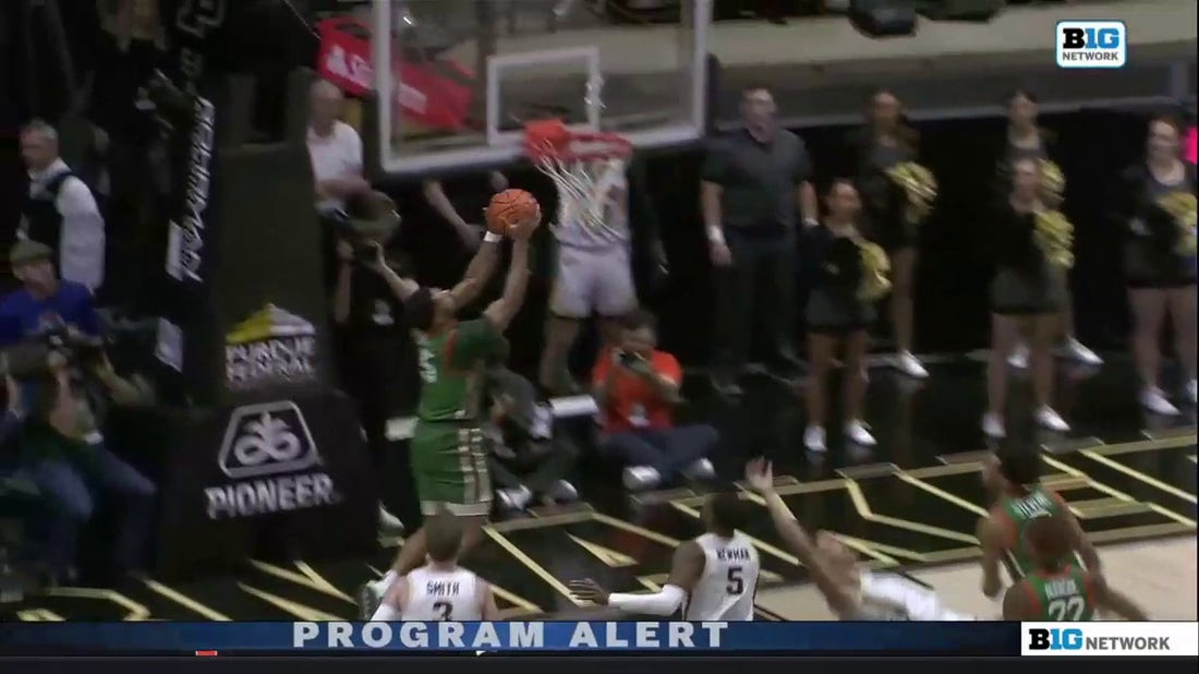 Florida A&M's Jaylen Bates throws down the alley-oop dunk after the steal on the other end of the court