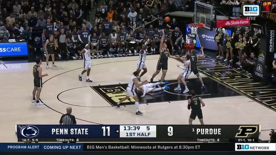 Purdue's Zach Edey scores in the paint and draws the foul against Penn State