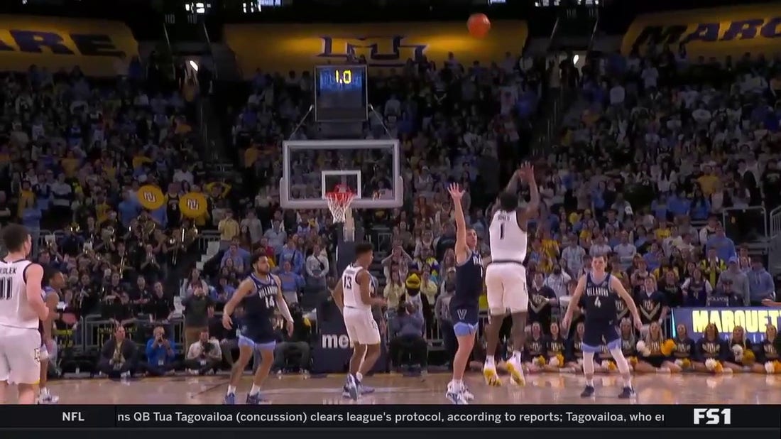 Kam Jones makes an INCREDIBLE half court shot at the buzzer for Marquette as they trail 35-34 at halftime