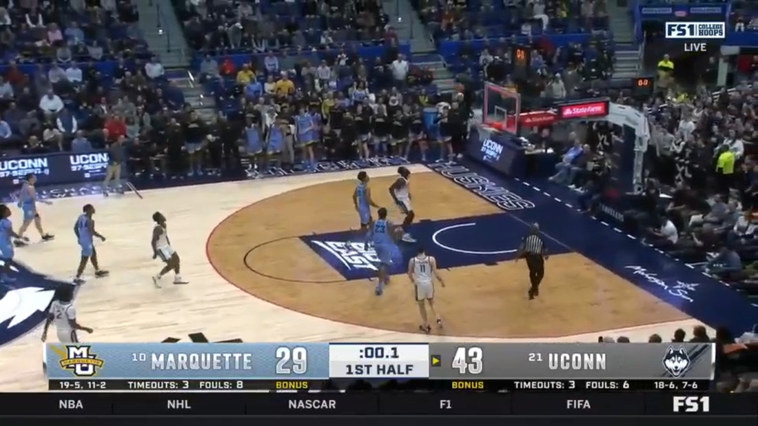 UConn's Nahiem Alleyne beats the buzzer to close out a stellar half for the Huskies