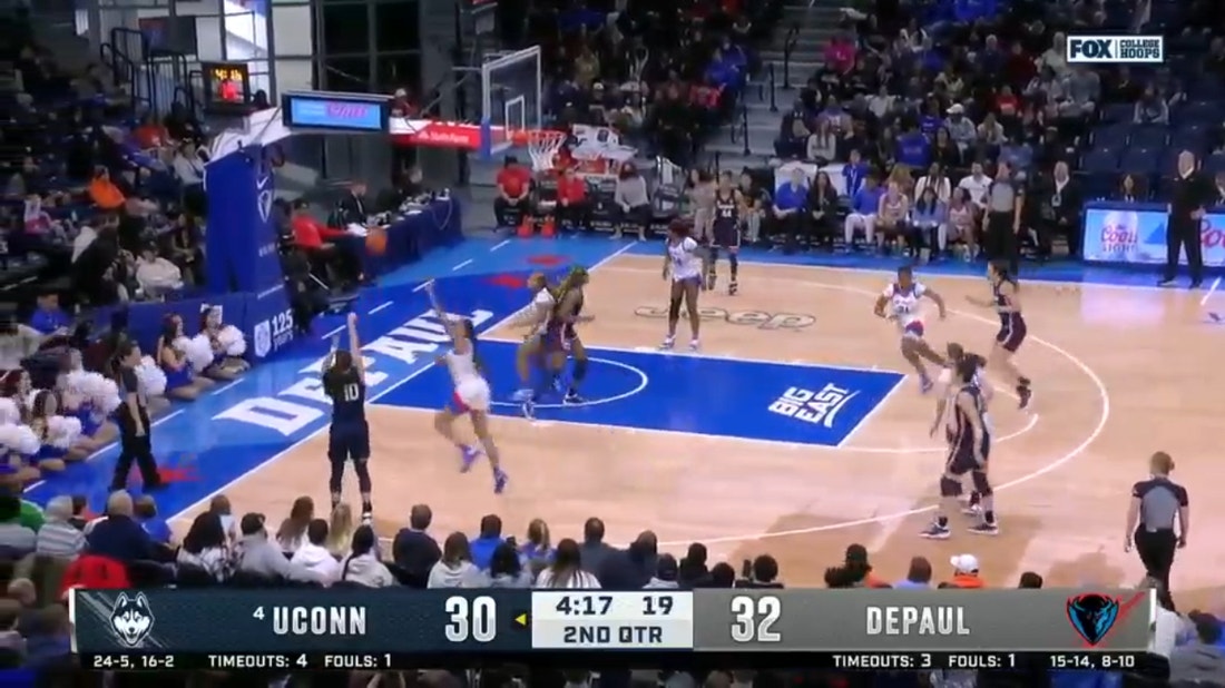 UConn's Nika Muhl drains a triple from the corner in the second quarter against DePaul on the road