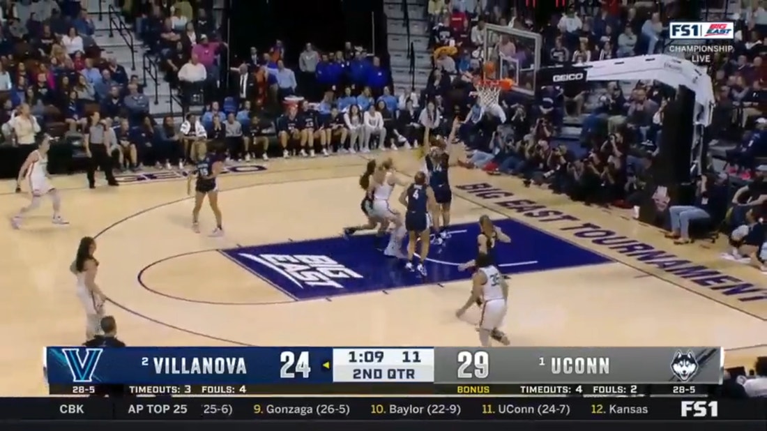 UConn's Aaliyah Edwards fights in the paint and gets two off the glass giving her 12 points in the first half over Villanova