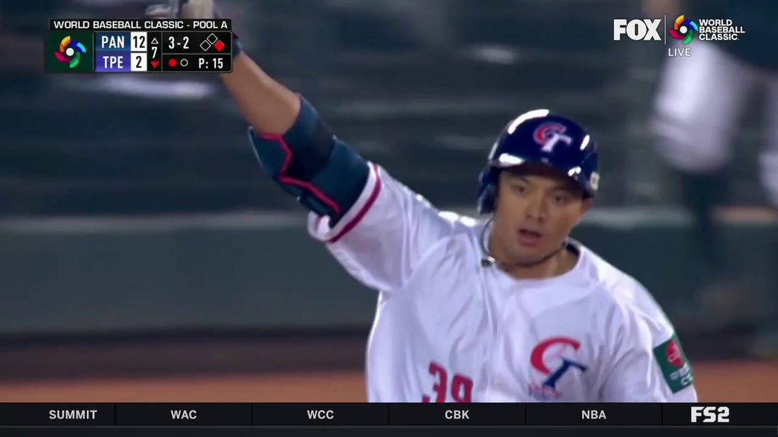 Chinese Taipei's Nien-Ting Wu hits the first home run of the 2023 World Baseball Classic