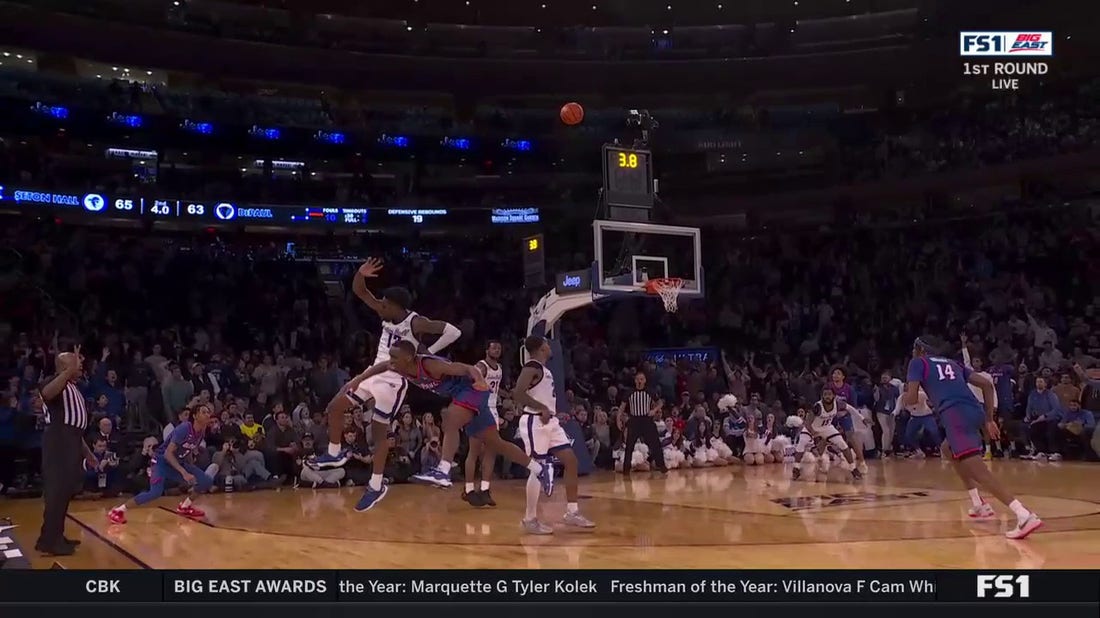 Seton Hall's Umoja Gibson draws a huge foul to give the Pirates the lead against DePaul