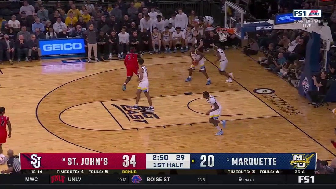 AJ Storr hits a WILD bank shot off glass to extend St. John's big first half lead vs. Marquette