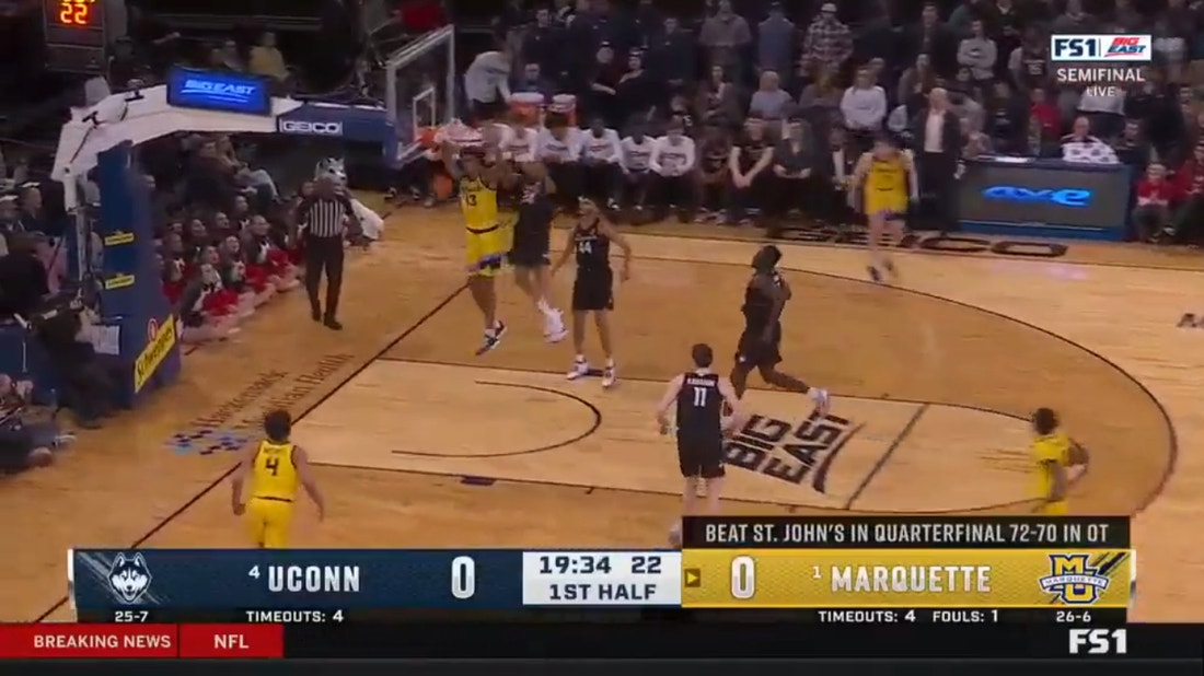 Marquette's Oso Ighodaro opens up the Big East semis with a spectacular two-handed slam against UConn