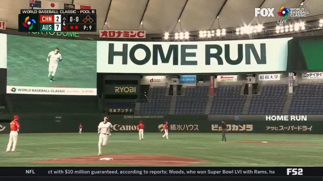 Australia's Robbie Glendinning crushes a 2-run jack to centerfield for a 7-2 lead over China