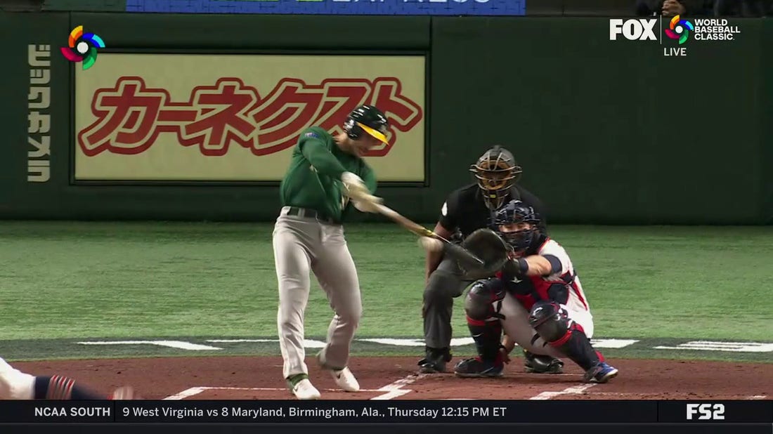 Alex Hall CRANKS a home run to deep right field to give Australia a 1-0 lead over the Czech Republic