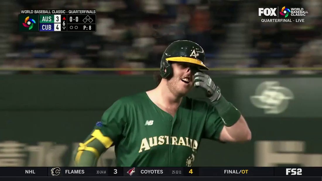 Australia's Rixon Wingrove crushes a two-run homer to right that trims Cuba's lead to 4-3