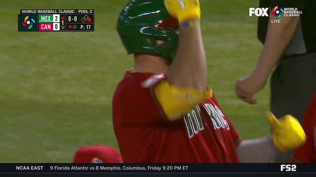 Rowdy Tellez soft-serves a two-run single to give Mexico an early 2-0 lead over Canada