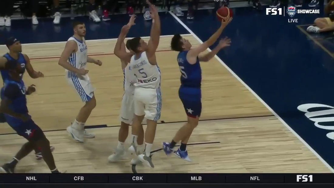 Austin Reaves finishes the layup plus a foul to extend Team USA's lead over Greece