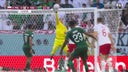 Mohamed Kanno's shot for Saudi Arabia was deflected by Poland's Wojciech Szczesny | 2022 FIFA World Cup