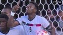 Cuba's Maikel Reyes scores on a PK to trim the deficit against Canada, 4-2