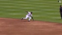 Tigers' Javier Báez pulls off a terrific grab and makes a spinning throw to get the out at first against the Blue Jays