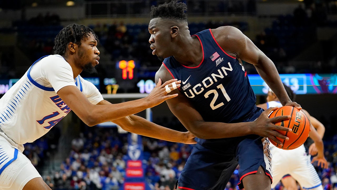 UConn's Adama Sanogo throws down an impressive contact poster dunk against DePaul