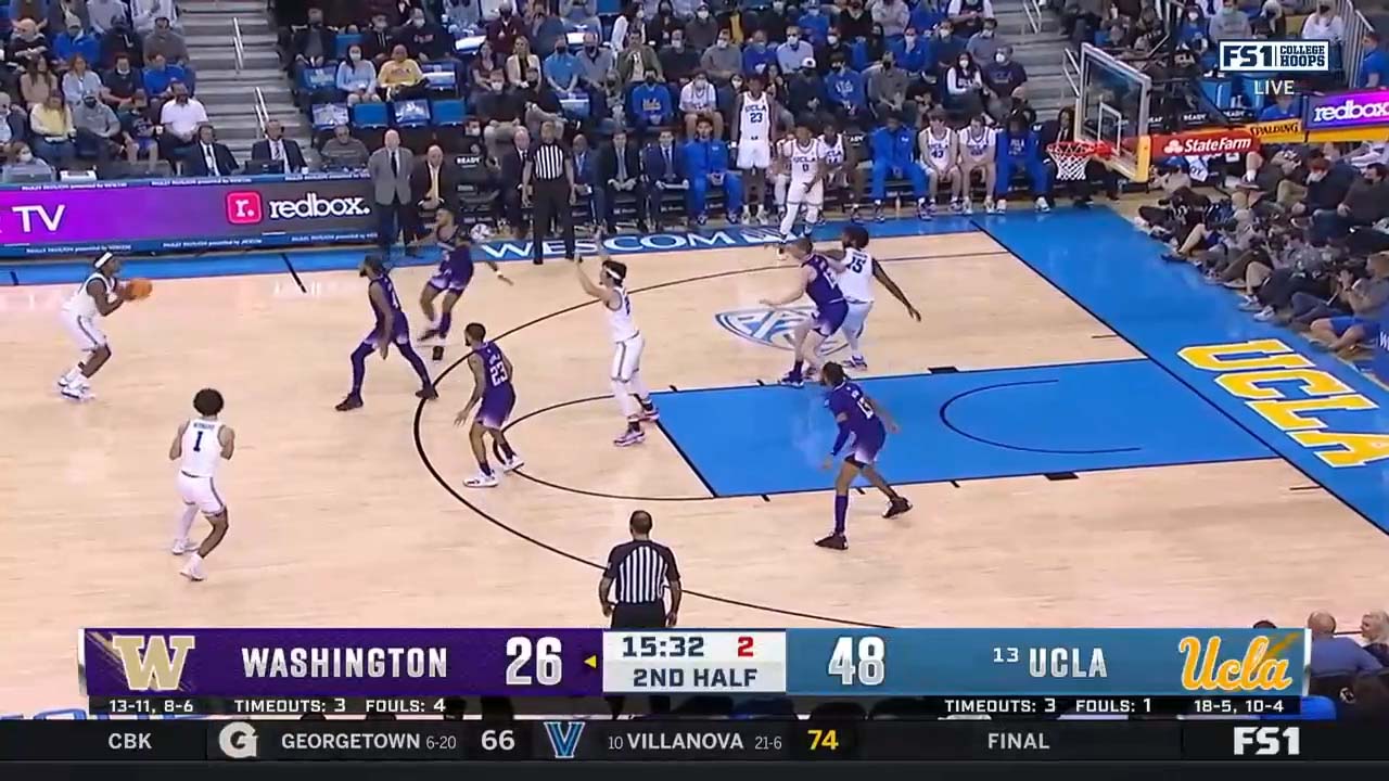 David Singleton drains a super deep three to keep UCLA ahead of Washington