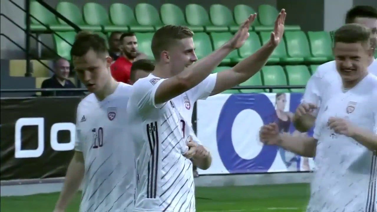 A lucky bounce leads to a goal by Vladislavs Gutkovskis to put Latvia up 3-1