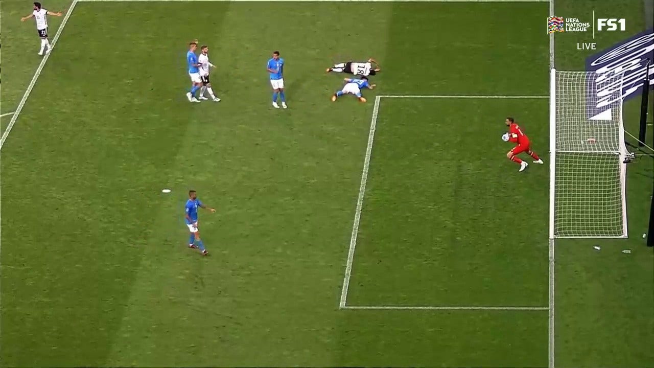 Ilkay Gündogan converts the penalty kick after Italy commits a foul in the box, 2-0