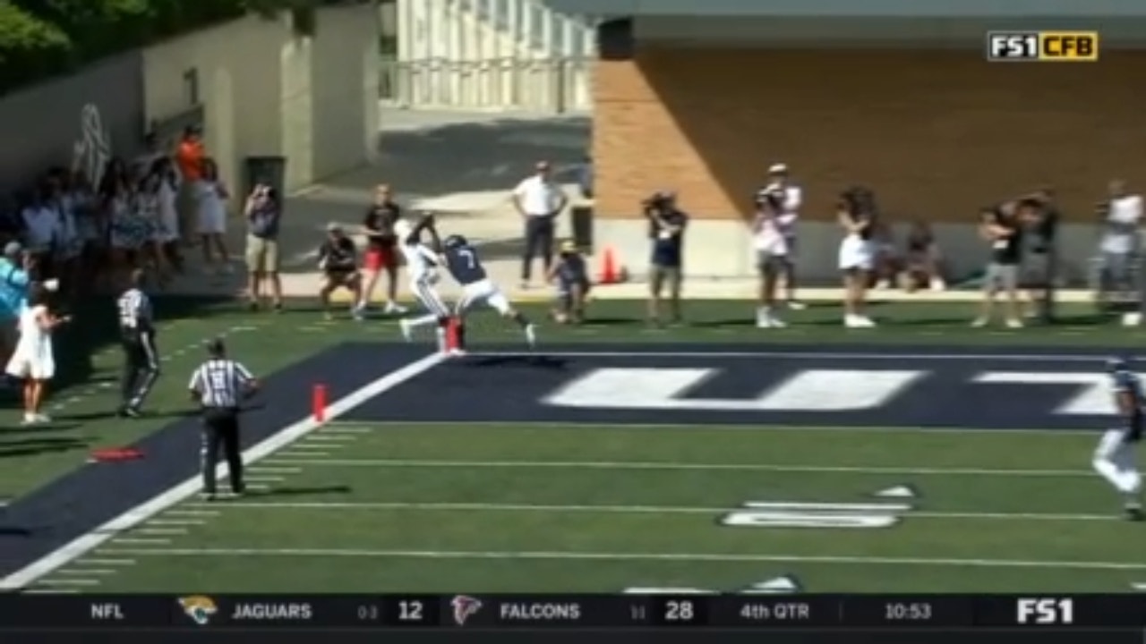 Utah State's Logan Bonner connects with Justin McGriff for a 14-yard touchdown