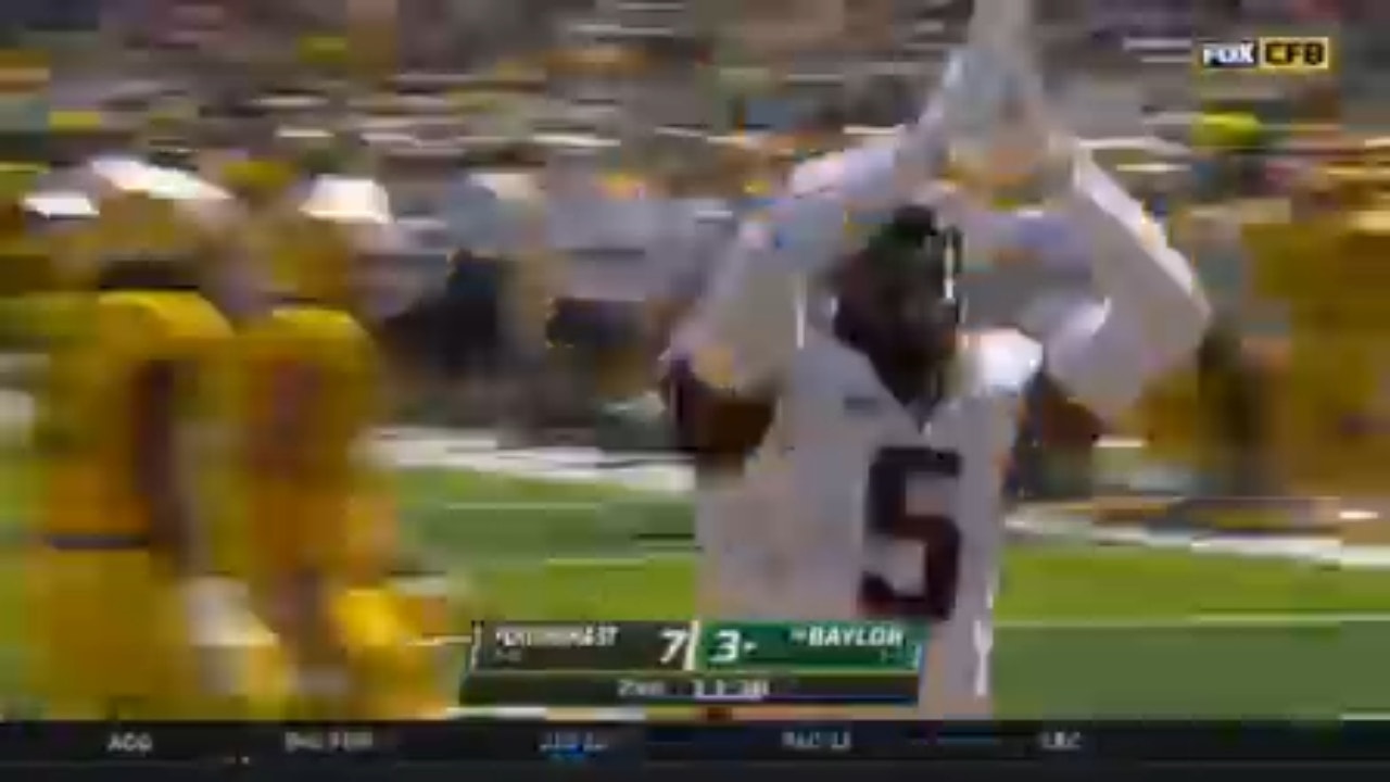 Oklahoma State takes a 9-3 lead over Baylor after a fantastic punt by Tom Hutton and a safety