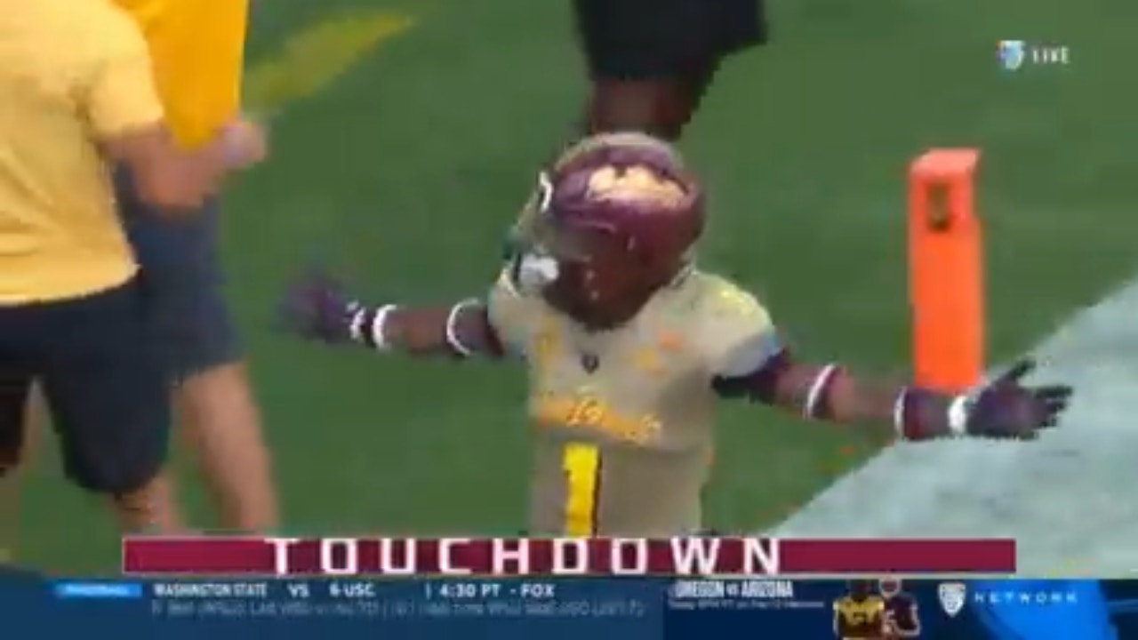 Washington's Michael Penix Jr. throws a pick-six off his lineman's helmet