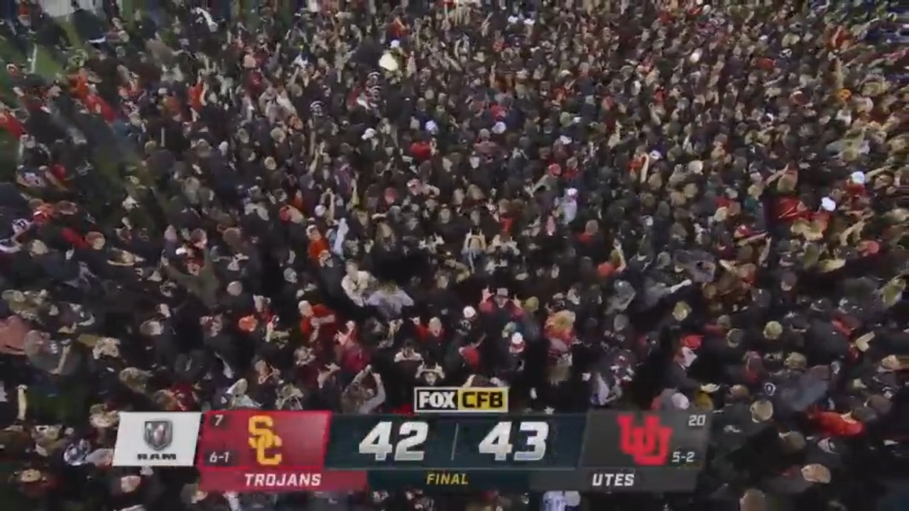 No. 20 Utah rushes the field after defeating No. 7 USC