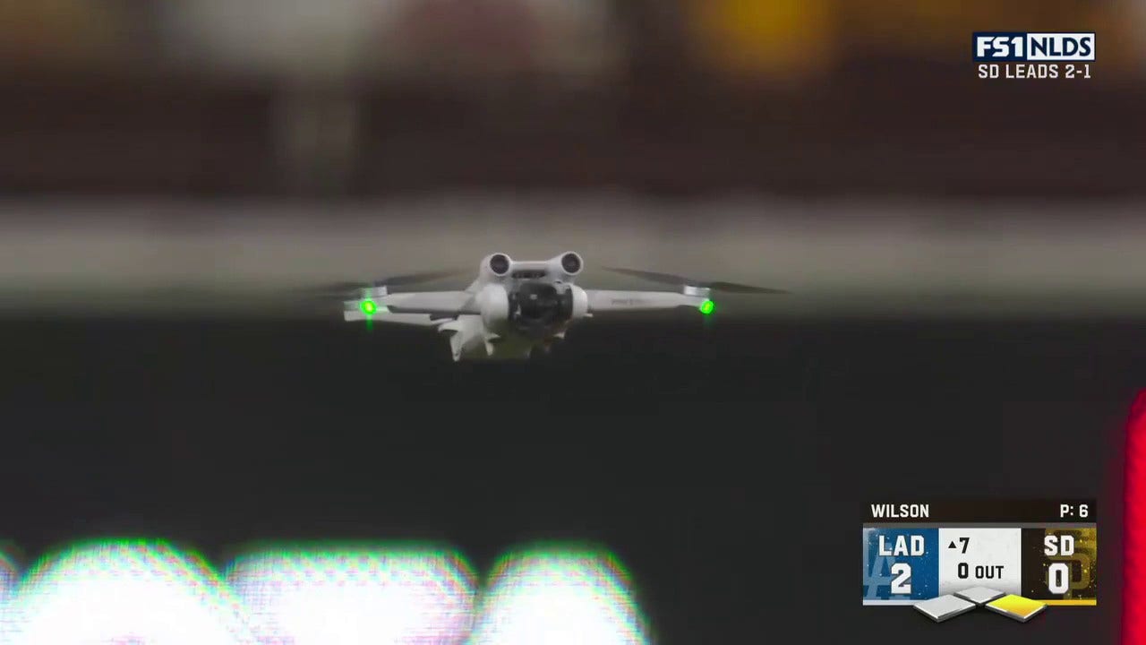 A drone causes a delay in the top of the 7th inning of the Dodgers vs. Padres game