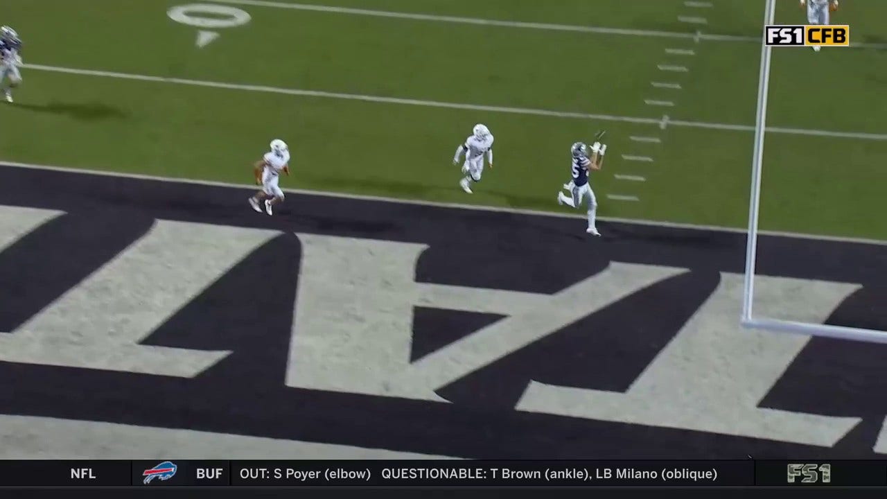 Kansas State's Adrian Martinez finds Kade Warner down the middle for the 25-yard touchdown