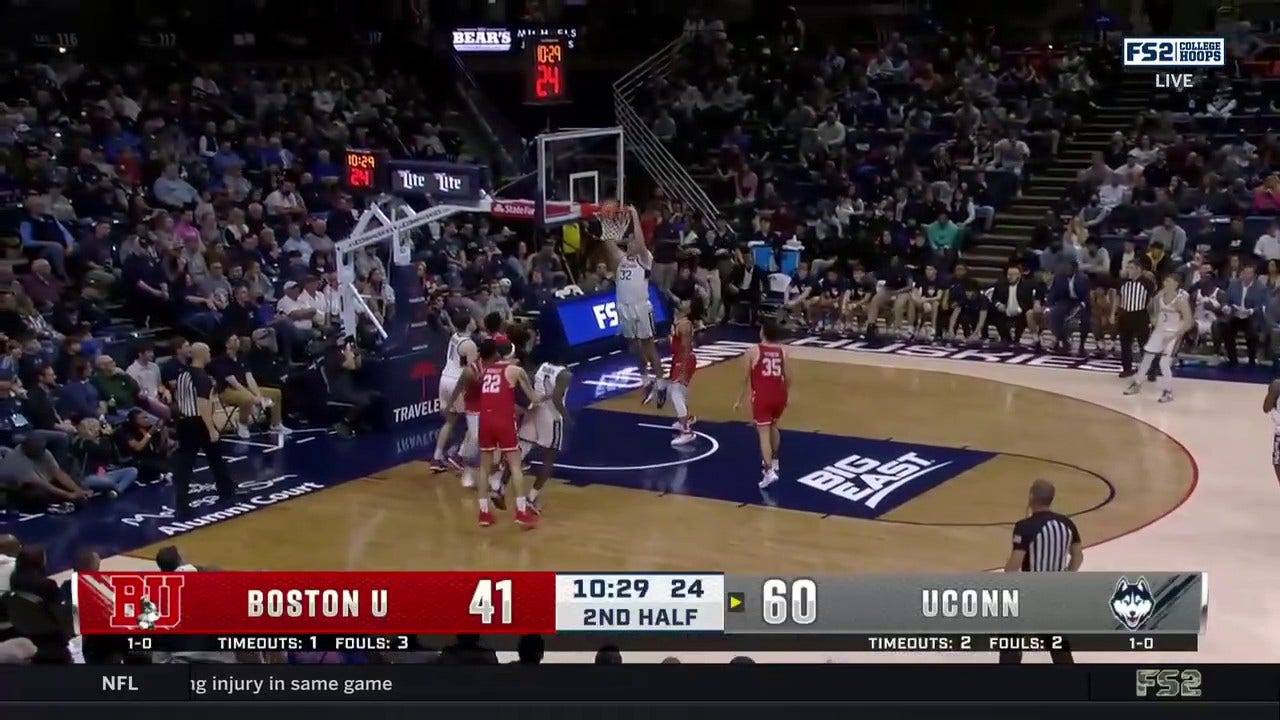 UConn's Donovan Clingan completely demolishes the rim after a fast-break turnover against Boston U