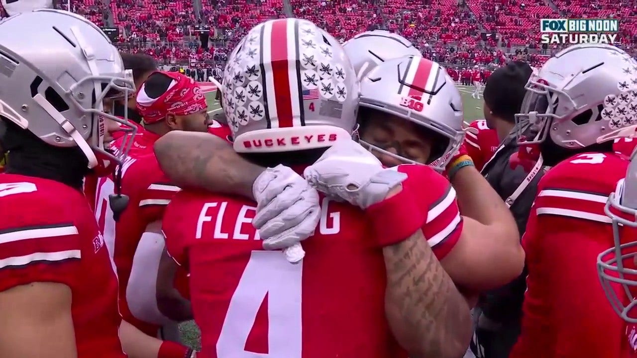 After Kamryn Babb's injury-filled career, he finally scores a touchdown and is celebrated by the whole team