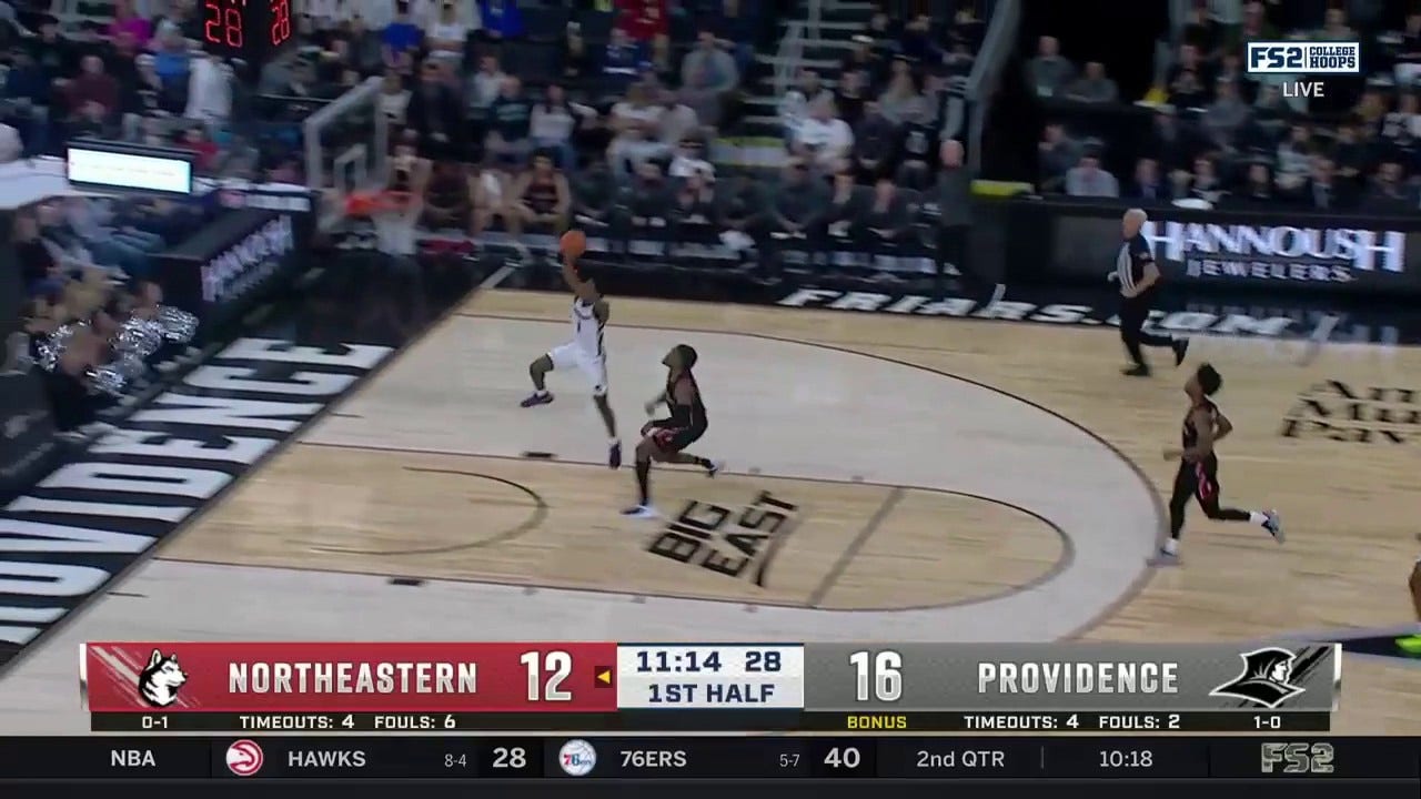 Providence's Jayden Pierre snags a steal and then throws down a one-handed dunk