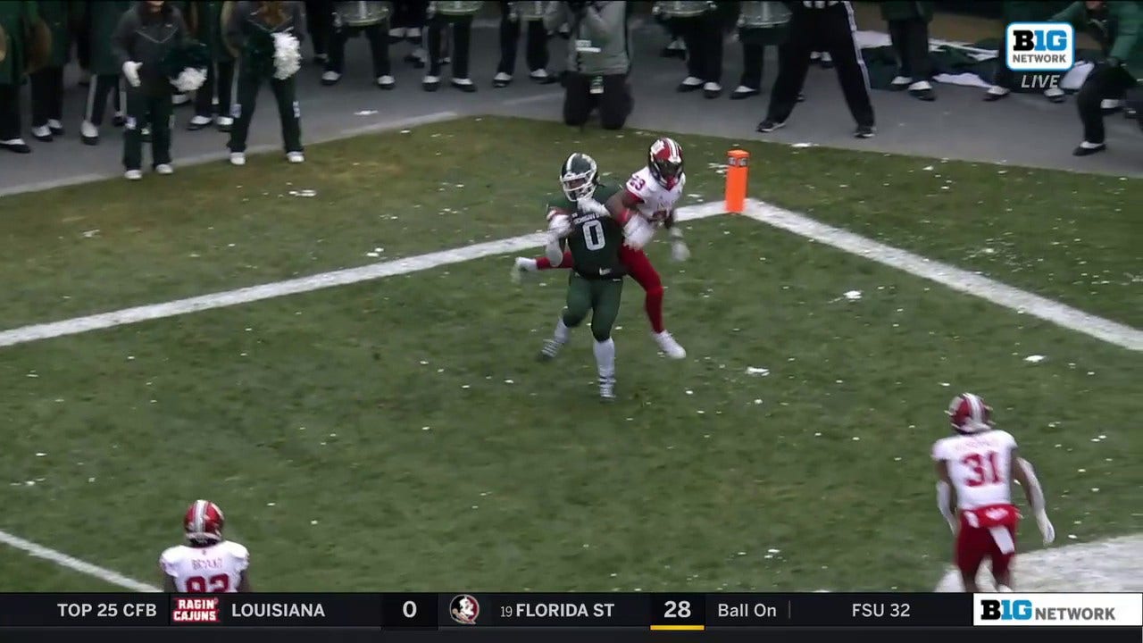 Keon Coleman uses his strength to haul in the fade route TD, extending Michigan State's lead
