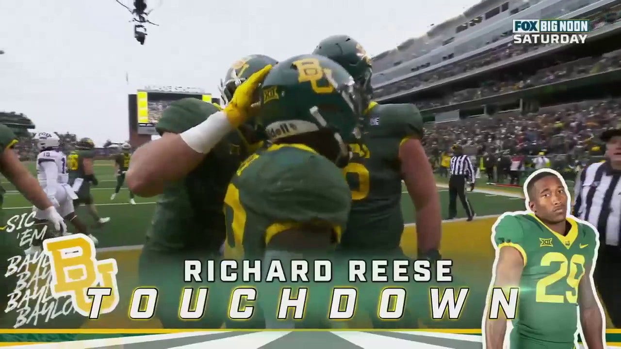 Richard Reese runs for a 1-yard touchdown extending the Baylor lead 28-20