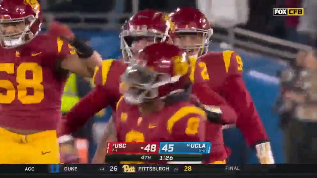 USC's Korey Foreman intercepts Dorian Thompson-Robinson to secure the Trojans' 48-45 win