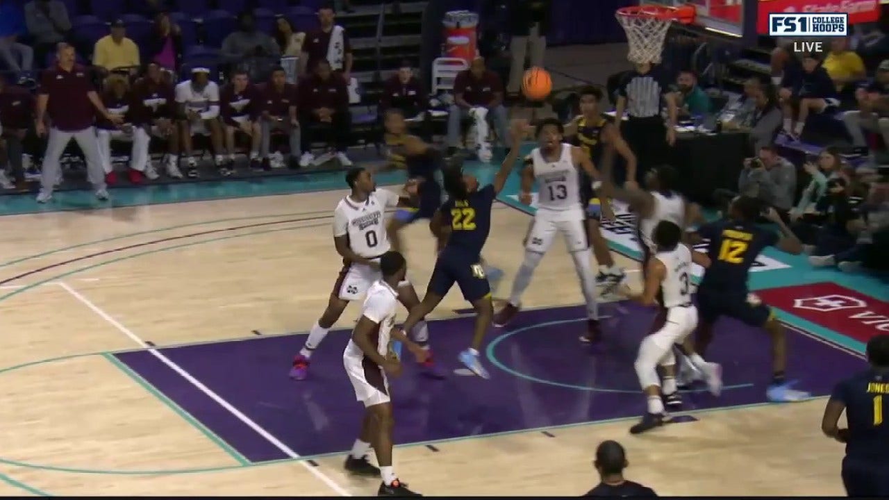 Sean Jones puts up beautiful fingeroll to close the margin vs Mississippi St.