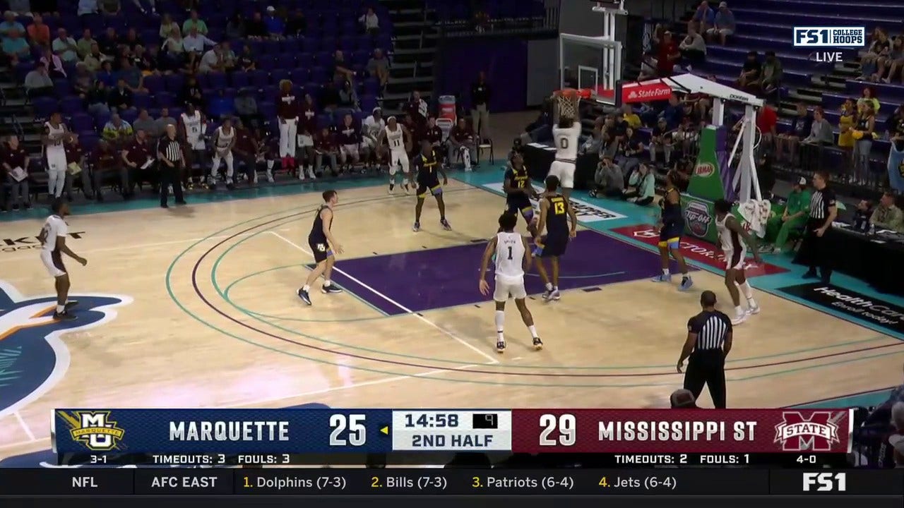 D.J. Jeffries drives the lane to slam it home vs Marquette