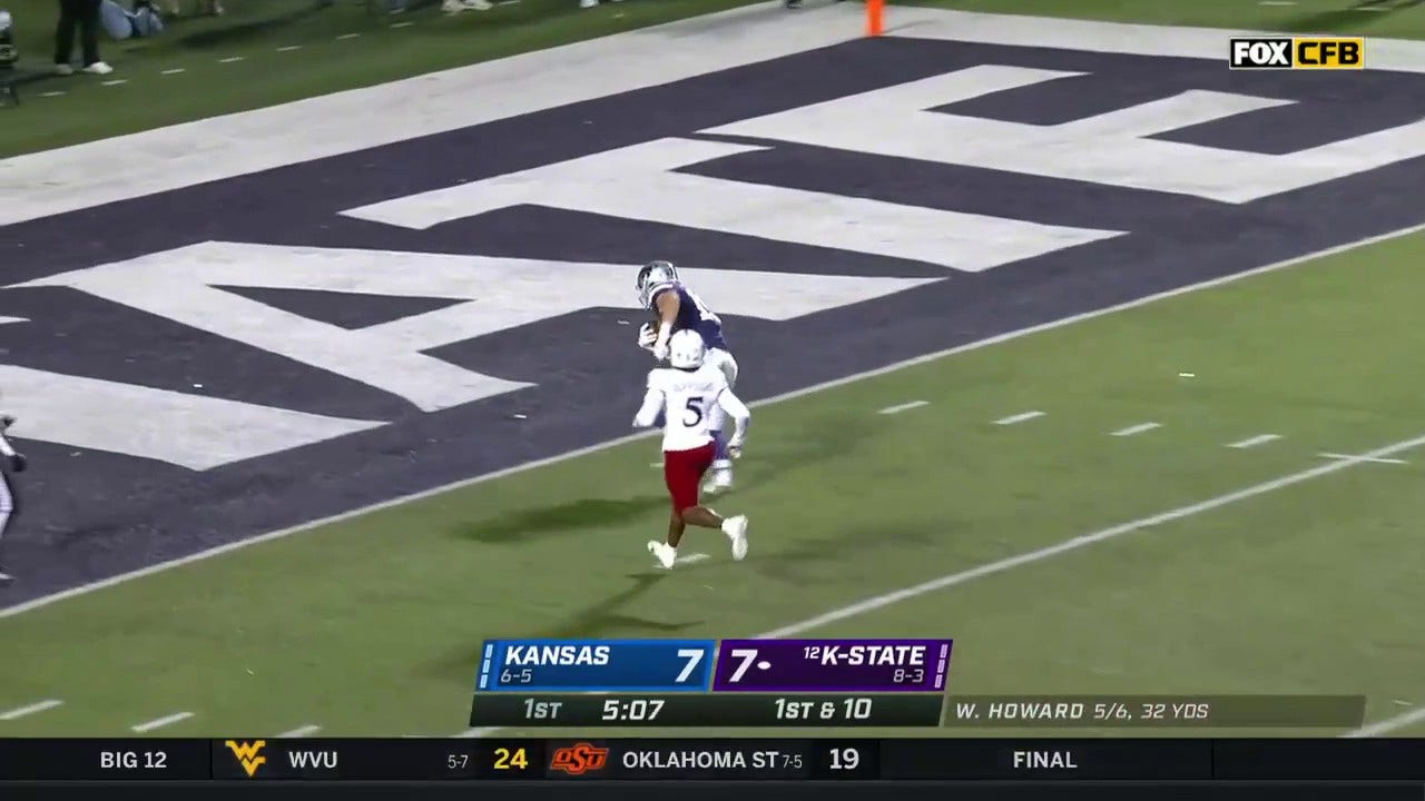 Kansas State Wildcats' Will Howard throws a deep 42-yard touchdown strike to Sammy Wheeler