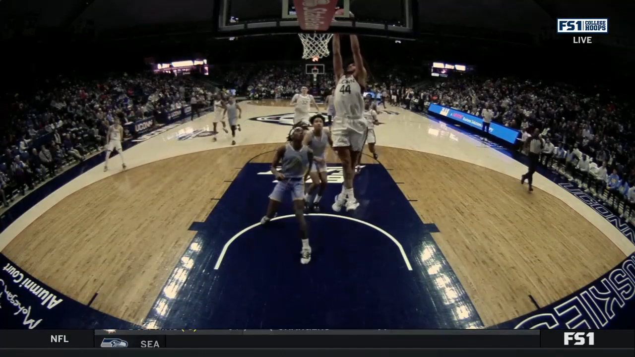 UConn's Andre Jackson gets the steal, and goes behind the back for the fast-break dunk