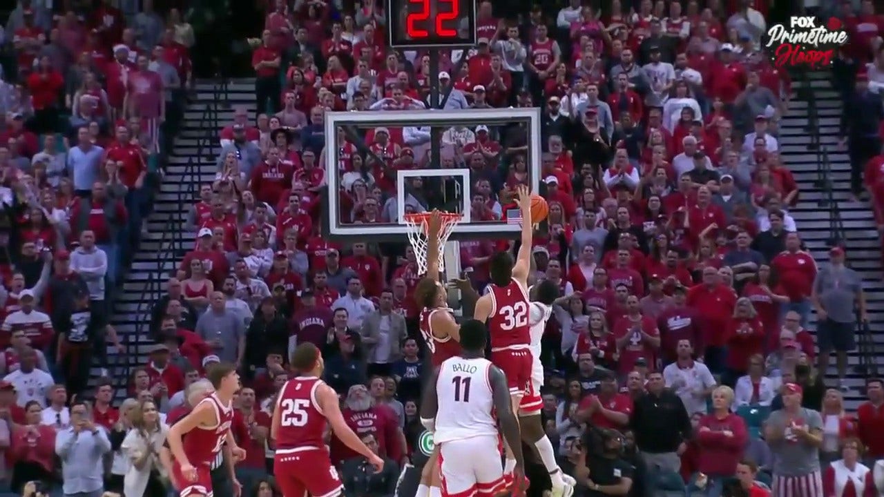 Indiana's Trey Galloway records a SICK block on Arizona's Courtney Ramey