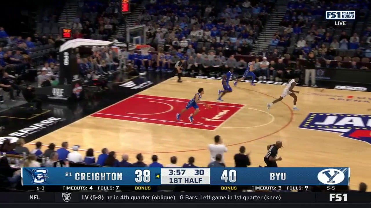 BYU's Atiki Ally Atiki throws down the alley-oop dunk from Dallin Hall