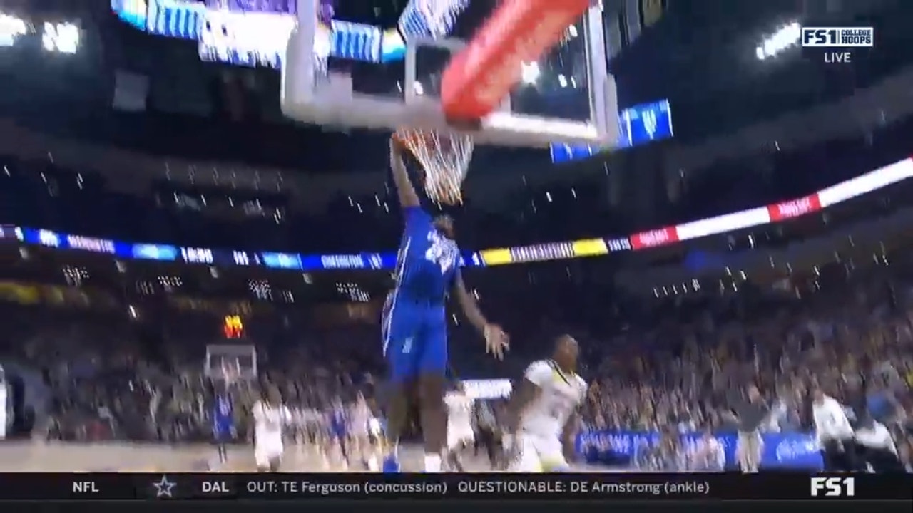 Creighton's Arthur Kaluma throws down a monster dunk to take the 15-12 over Marquette